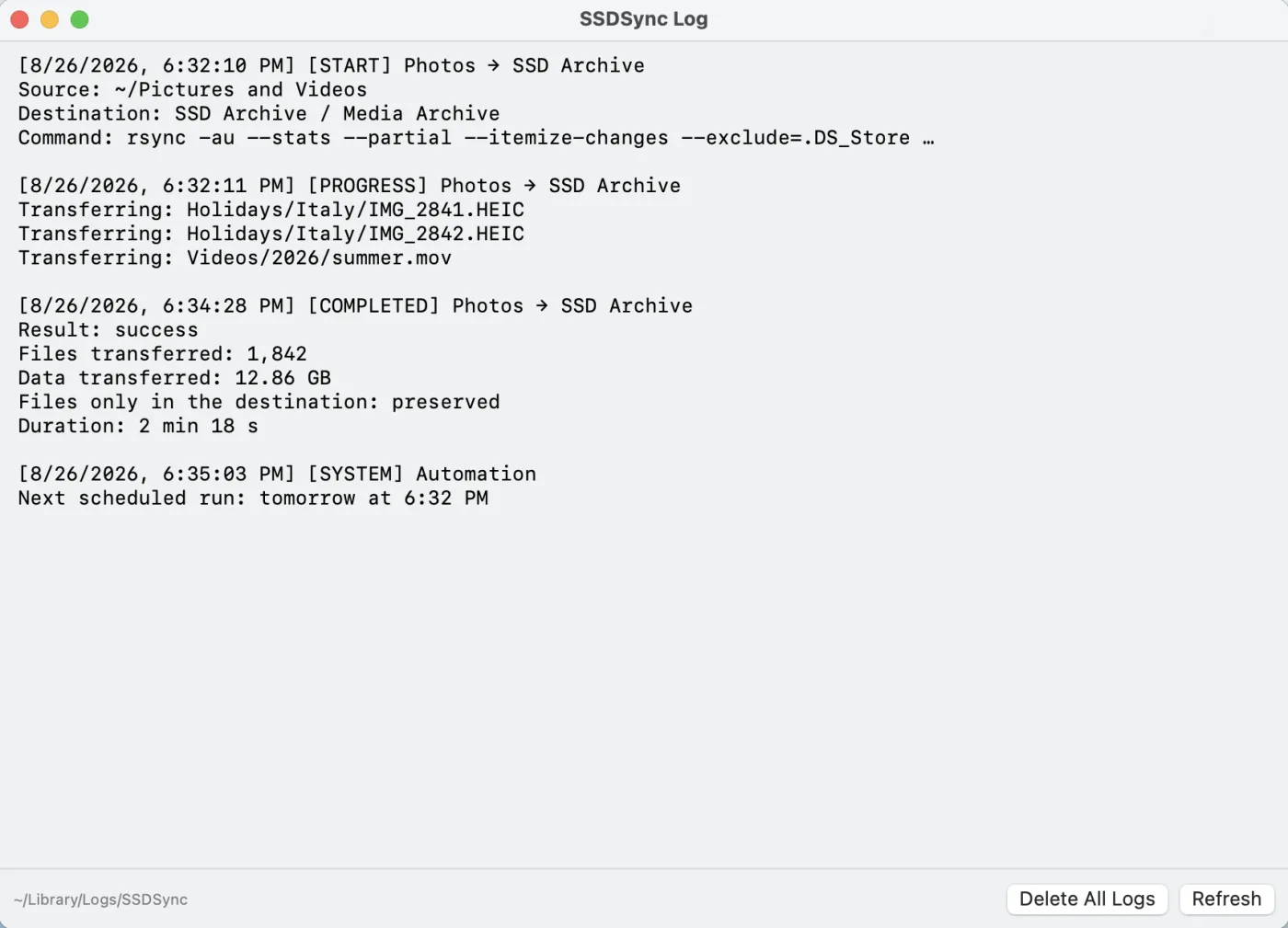 Log window listing a sync run with files transferred, data size, duration and destination-only files preserved